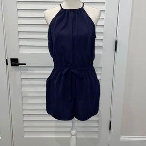 Navy blue XL short romper in excellent condition. Worn once.Fun and flirty!!